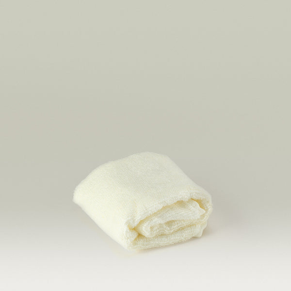 Tropic Bamboo Face Cloth folded neatly, made from soft and sustainable bamboo fabric for gentle cleansing.